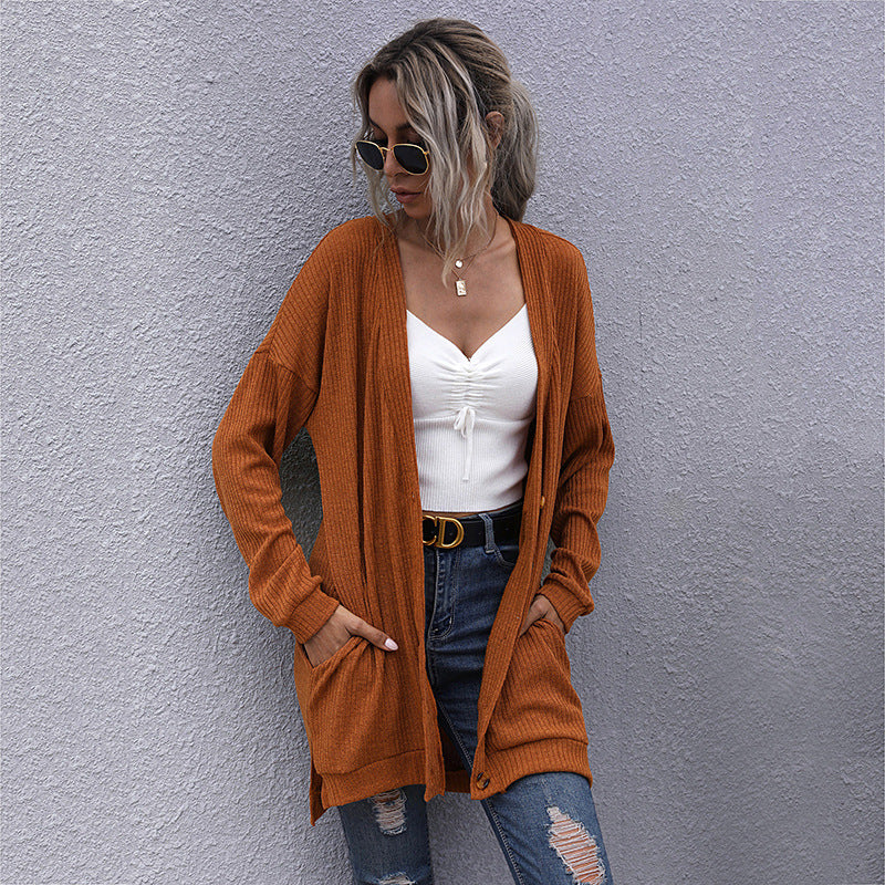 Damen Strickjacke mit geripptem Design und praktischen Taschen WW