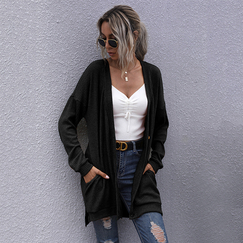 Damen Strickjacke mit geripptem Design und praktischen Taschen WW