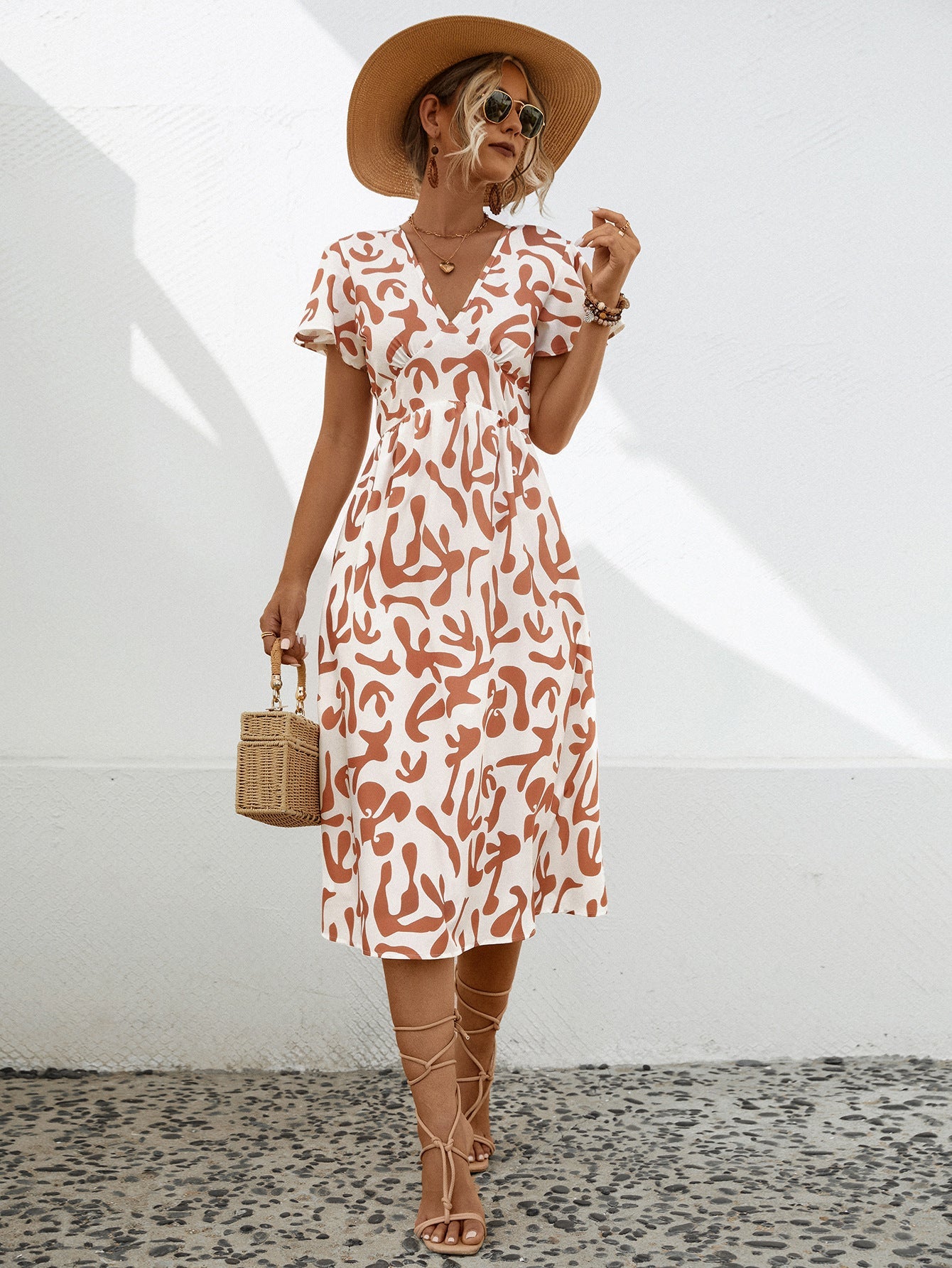 Damen Midi-Kleid mit V-Ausschnitt und fließenden Rüschendetails WW