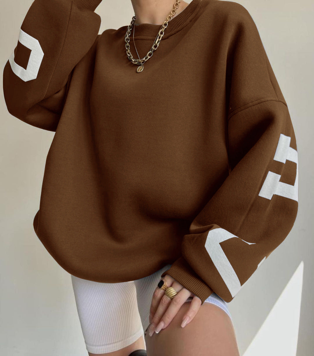 Damen Oversize Sweatshirt mit modischen Schriftzügen WW