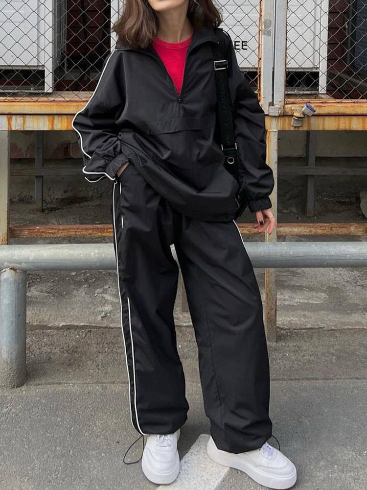 Damen sportliches Windbreaker-Set mit funktionalem Halbreißverschluss und seitlichen Kontraststreifen WW