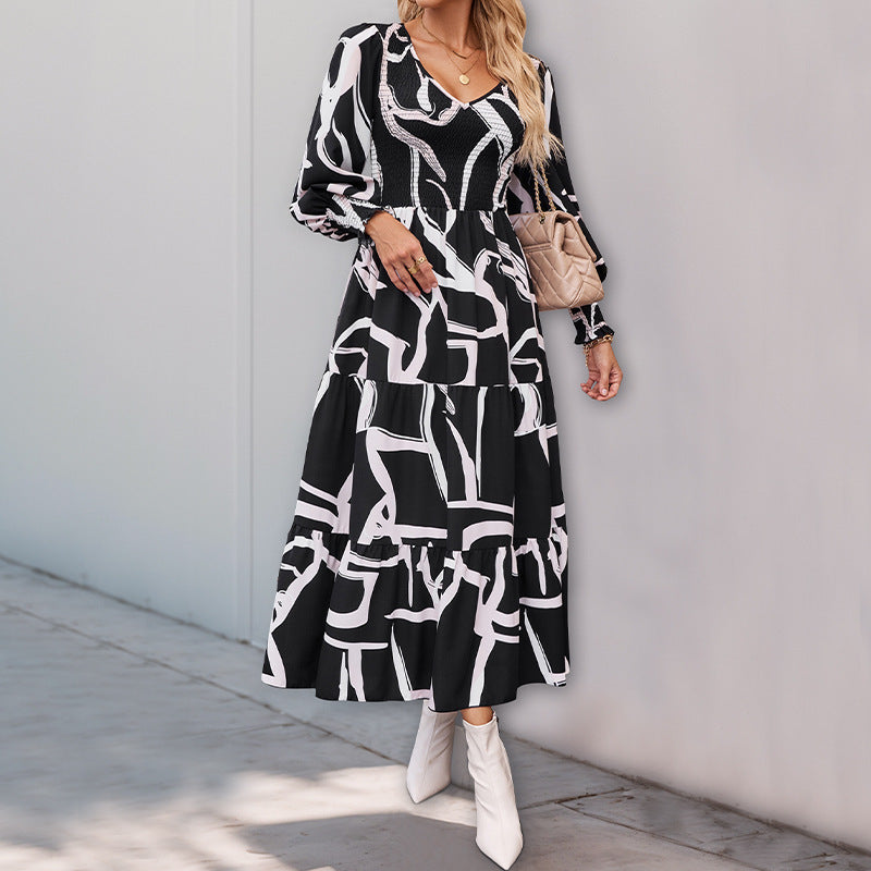 Damen Maxikleid mit modernen grafischen Mustern und voluminösen Ärmeln WW