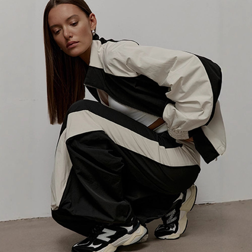 Damen Sportjacke mit hoch stehendem Kragen und kontrastierenden Ärmeln WW