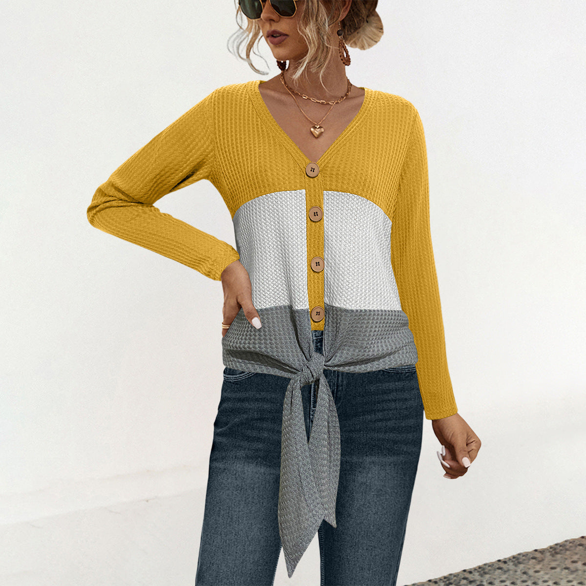 Damen Strickjacke mit Karomuster und knöpfbarem Detail WW