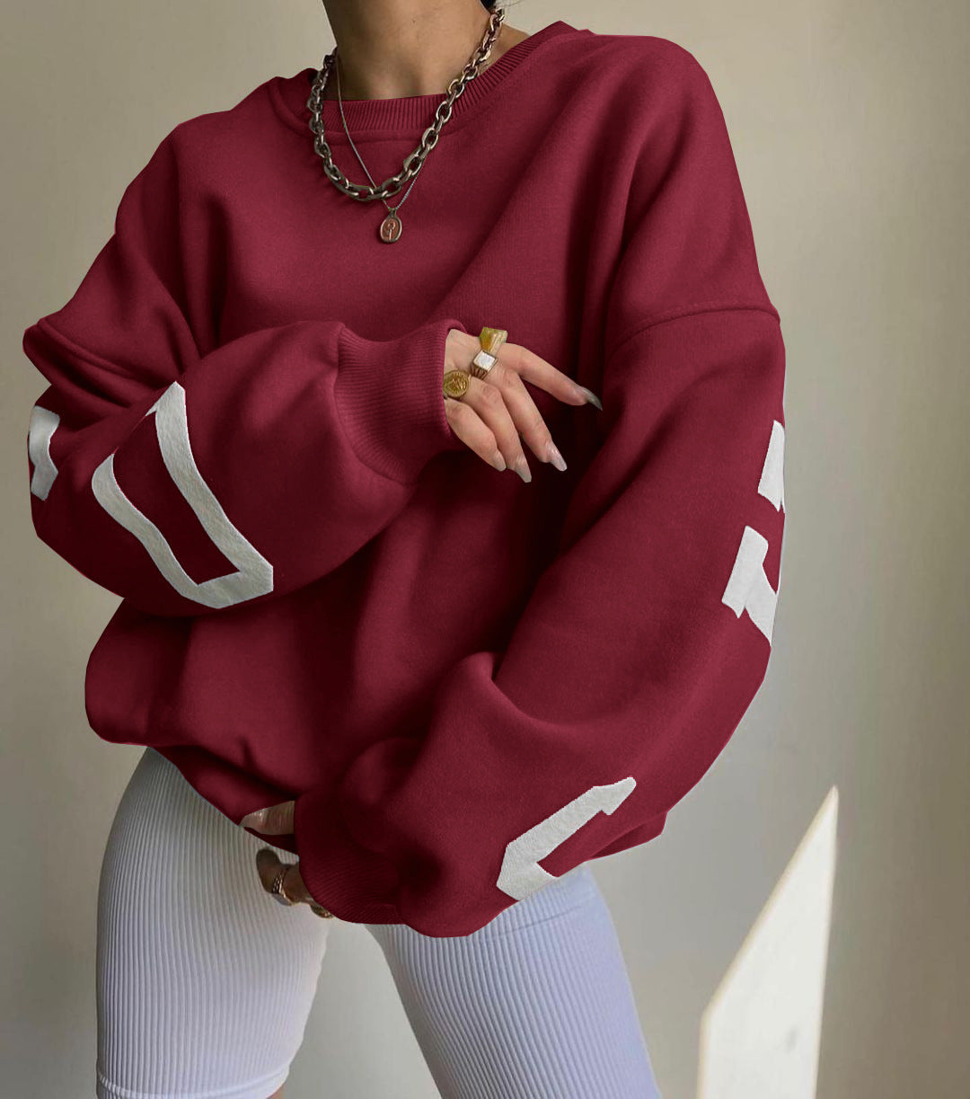 Damen Oversize Sweatshirt mit modischen Schriftzügen WW