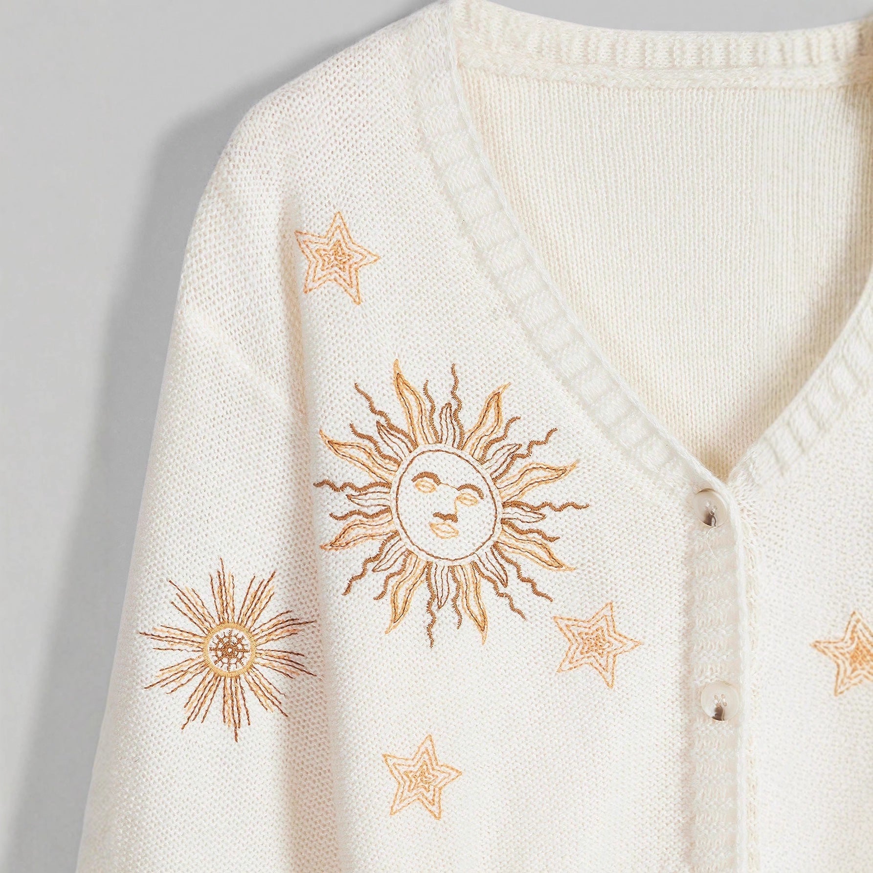 Damen Strickjacke mit kunstvollem Sonnen- und Sternenstick WW