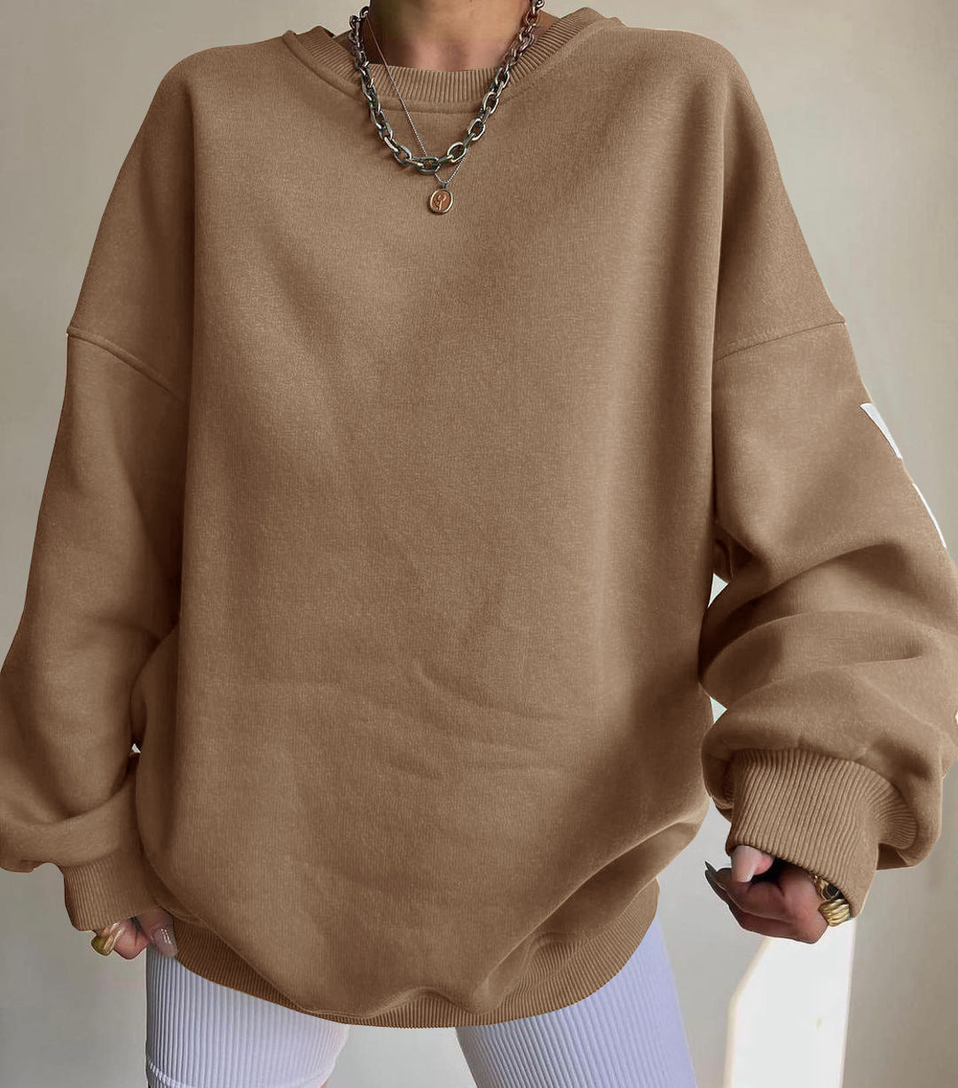 Damen Oversize Sweatshirt mit modischen Schriftzügen WW
