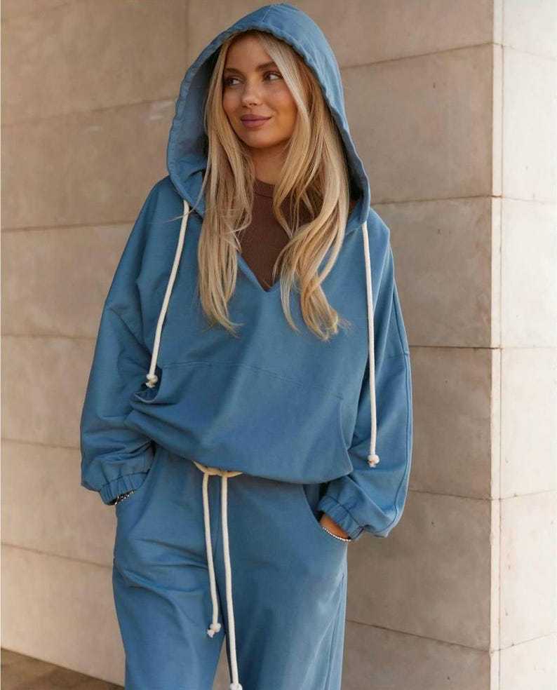Damen lässiges Sport-Set mit Kapuze und praktischen Taschen WW