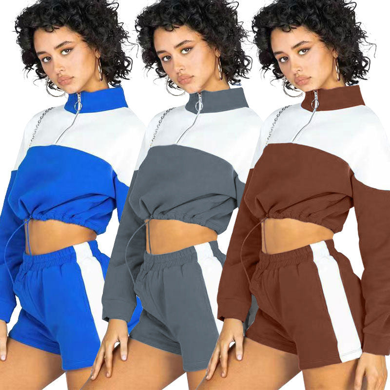 Damen modernes Sportoberteil mit kurzem Schnitt und dazu passender Shorts WW