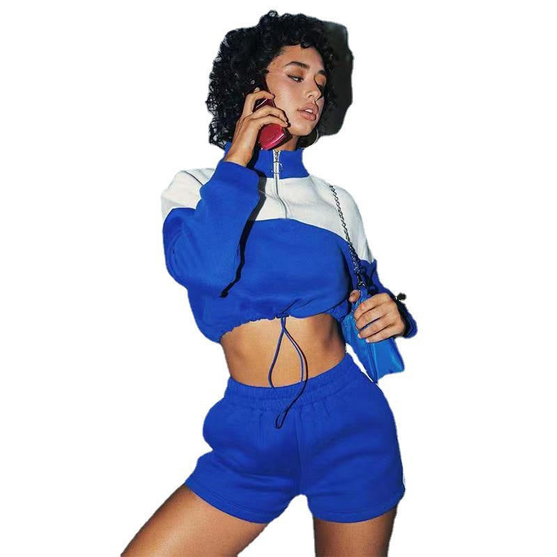 Damen modernes Sportoberteil mit kurzem Schnitt und dazu passender Shorts WW