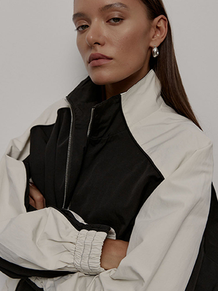 Damen Sportjacke mit hoch stehendem Kragen und kontrastierenden Ärmeln WW