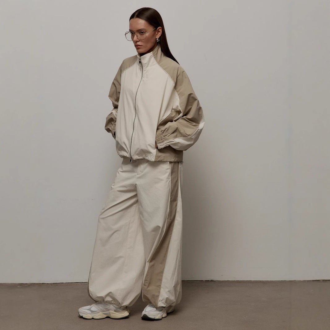 Damen Sportjacke mit hoch stehendem Kragen und kontrastierenden Ärmeln WW