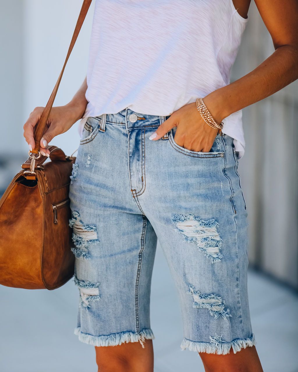 Damen lässige Denim-Shorts mit fransigem Saum und auffälligem Used-Look WW