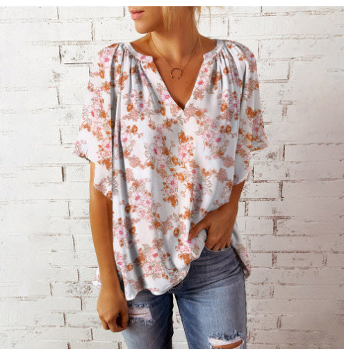 Damen Blusenshirt mit floralem Design und V-Ausschnitt WW