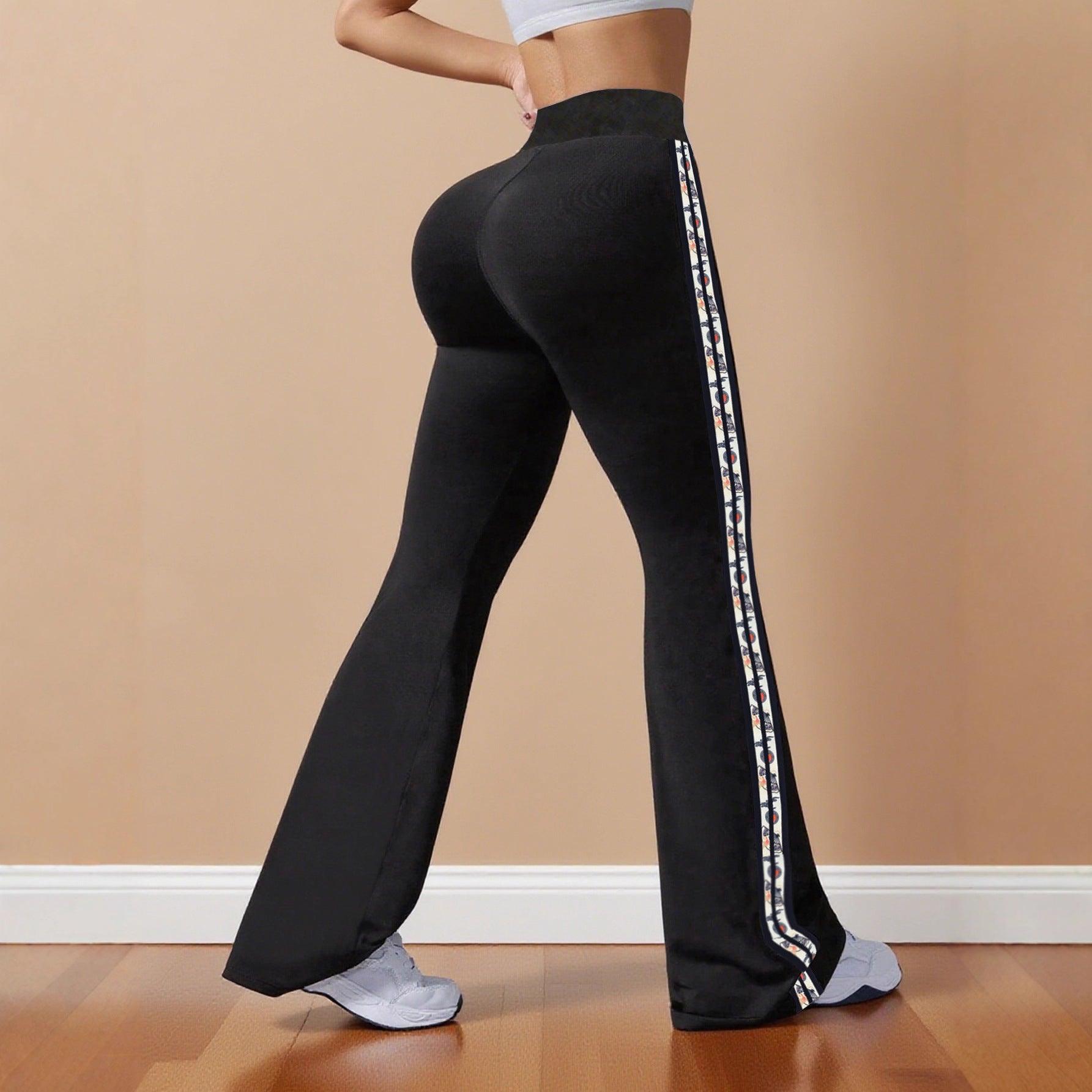 Damen Sportliche Flared-Leggings mit kontrastierenden Seitenstreifen WW