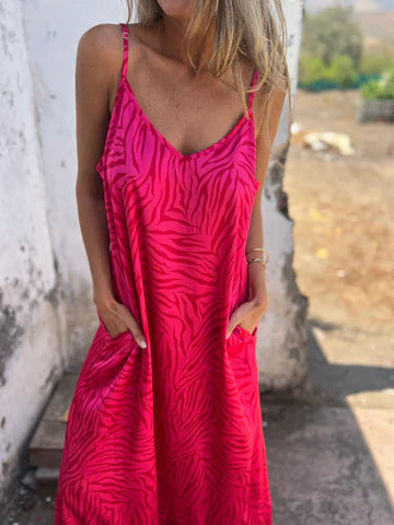 Damen Maxikleid mit auffälligem Zebra-Muster und praktischen Seitentaschen WW