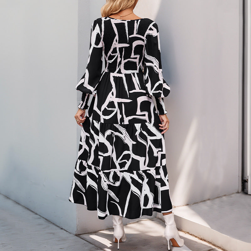 Damen Maxikleid mit modernen grafischen Mustern und voluminösen Ärmeln WW