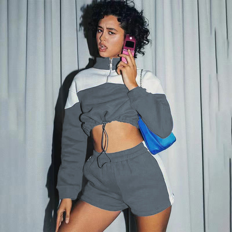 Damen modernes Sportoberteil mit kurzem Schnitt und dazu passender Shorts WW