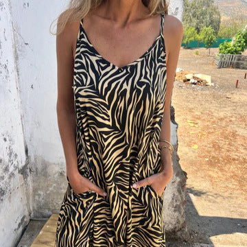 Damen Maxikleid mit auffälligem Zebra-Muster und praktischen Seitentaschen WW